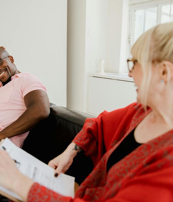 Happy client sharing positive experience after wellness program completion