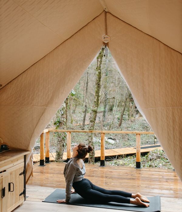 Individual practicing mindful breathing exercises in outdoor setting