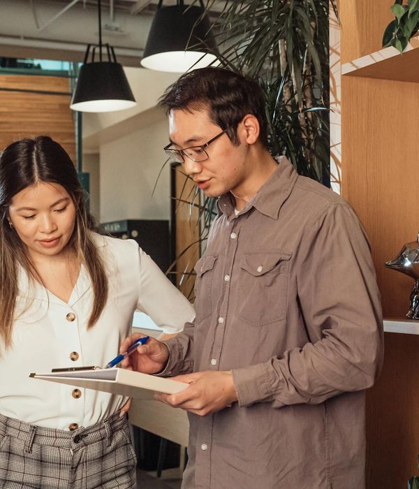 Professional team member providing consultation in modern office space