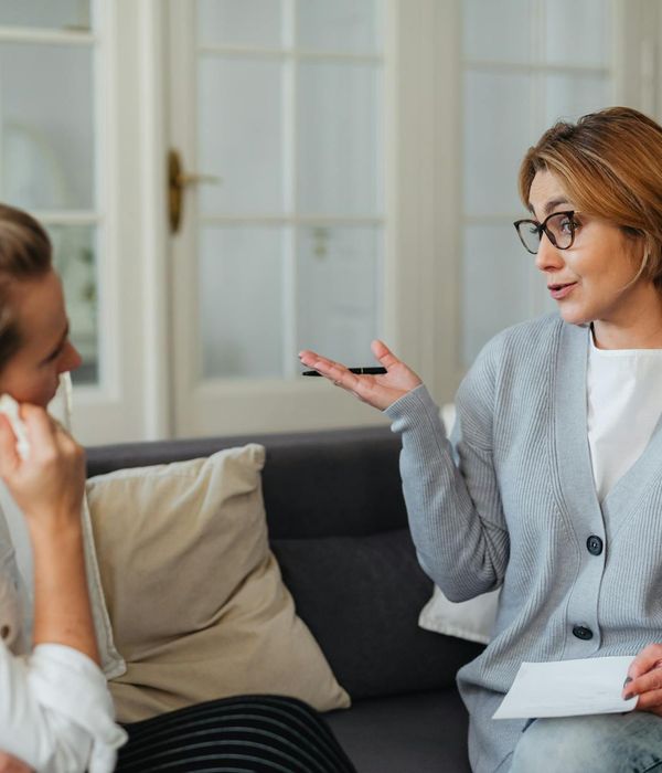 Supportive consultation session in comfortable wellness center environment